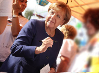 Merkel'den erken seçim sinyali
