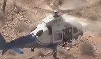 Baş döndüren kurtarma operasyonu! Yaralı kadını kurtarma helikopterinden de kurtardılar