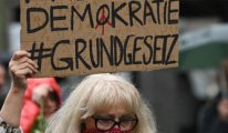 Almanya'da maske takmayanlara 18 bin euro ceza