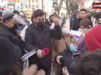 'Çıkar telefonunu' diyen AKP'linin suratına desteyle para atıldı